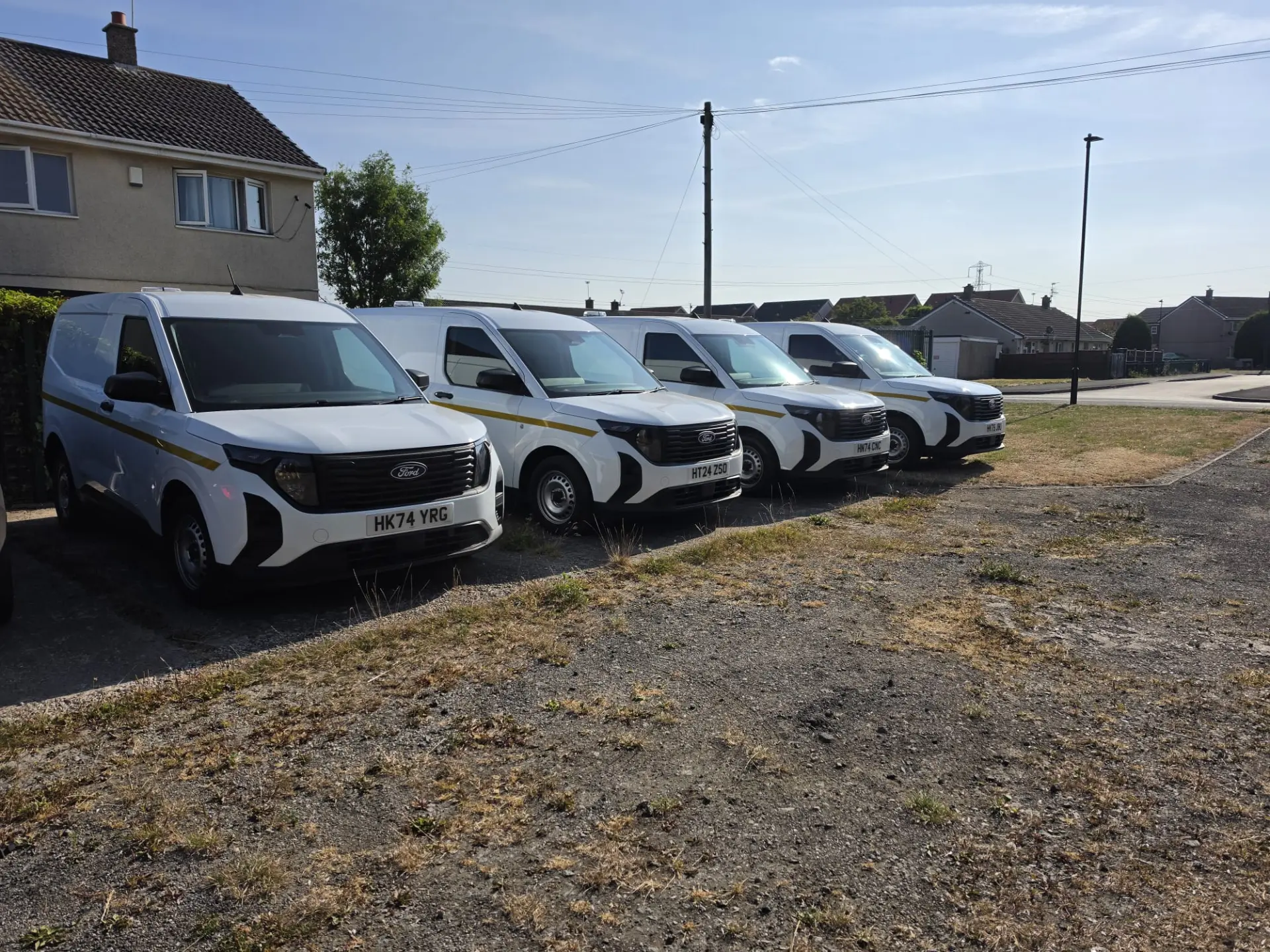 Greener Highways Ltd company vans lined up ready for deployment