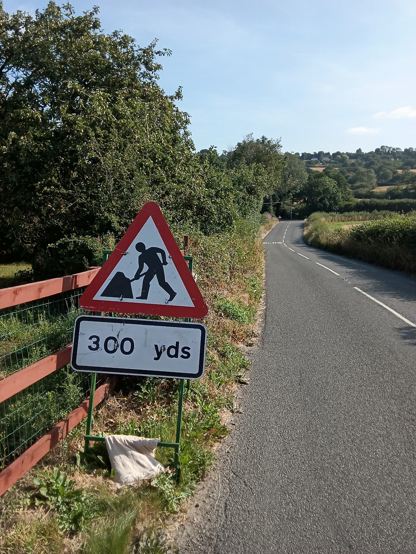 Road works ahead sign on a rural road